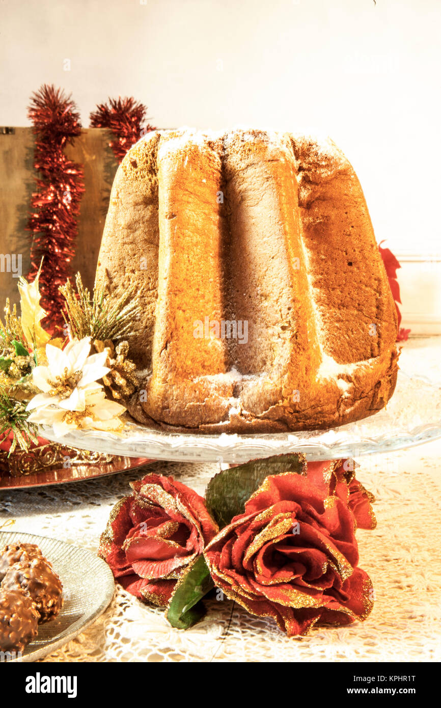 il pandoro a typical italian christmas dessert on a beautiful table with decorations - Italian Christmas Table Decorations il pandoro a typical italian christmas dessert on a beautiful table with decorations - Italian Christmas Table Decorations