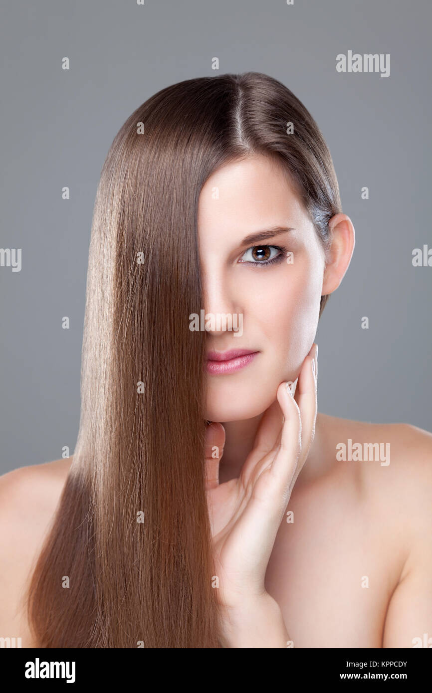 Beautiful Brunette With Long Straight Hair Stock Photo Alamy