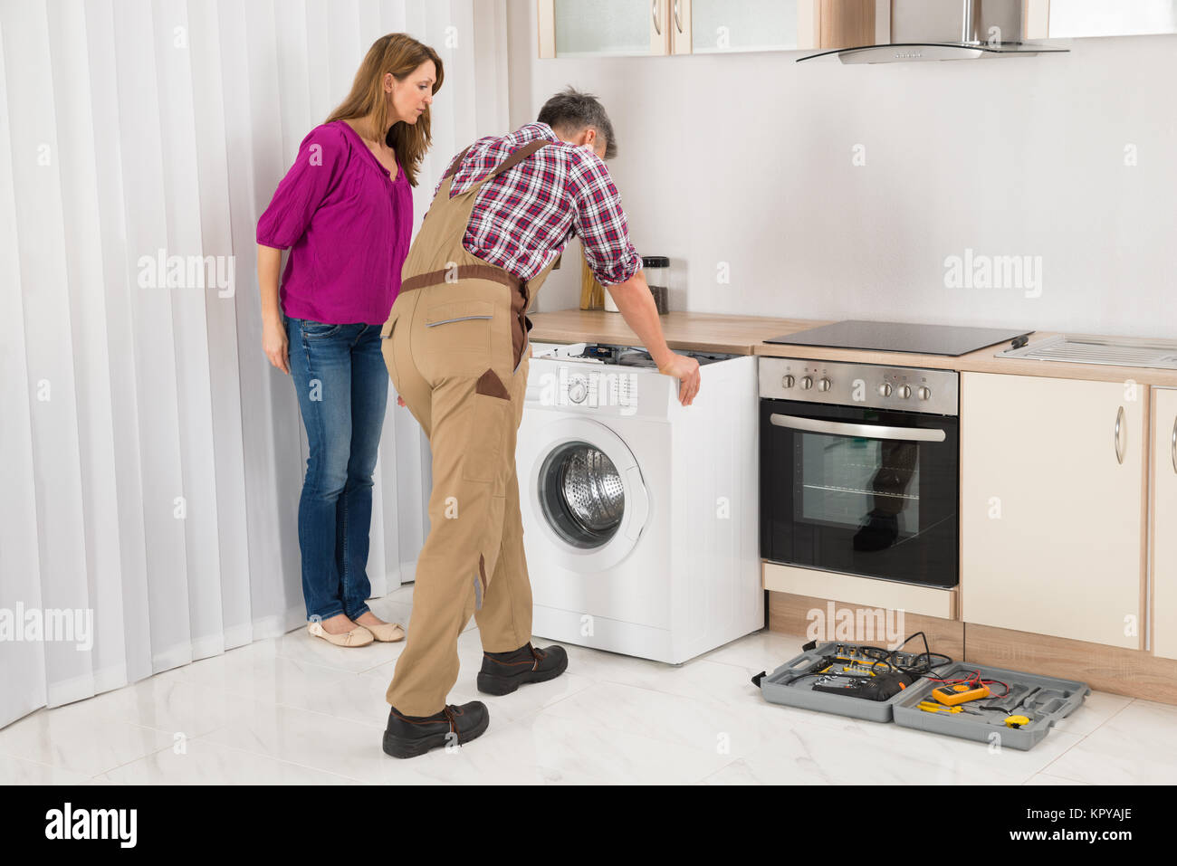 Washing Machine Repair Stock Photos &amp; Washing Machine ...