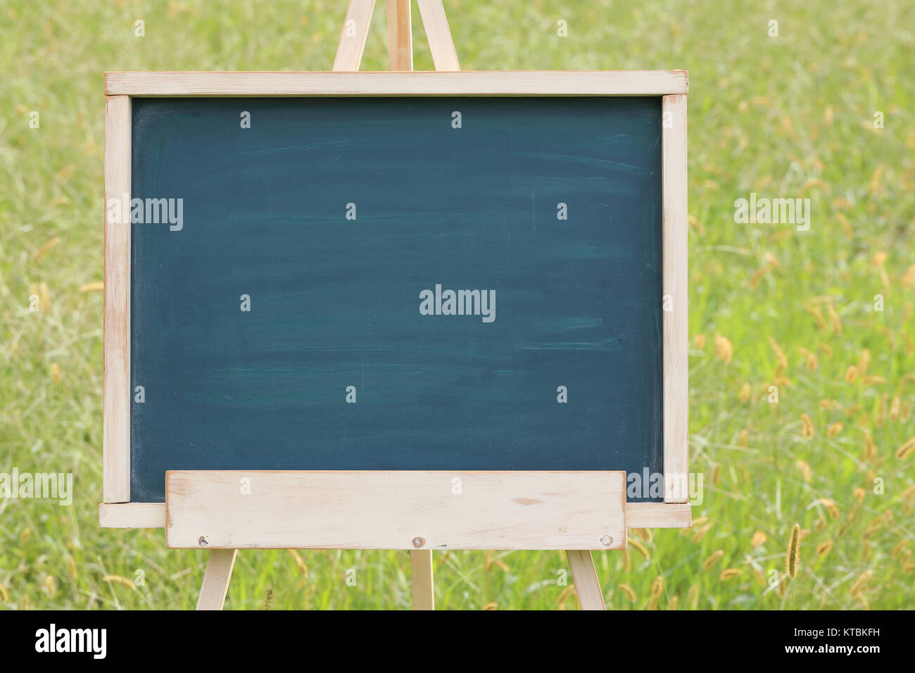 blank chalkboard with wooden