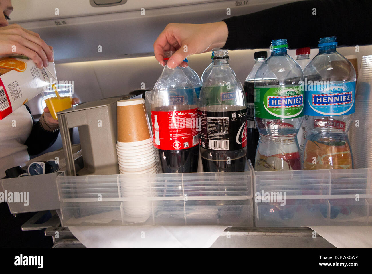 Air Stewardess Serving Food Stock Photos & Air Stewardess Serving Food