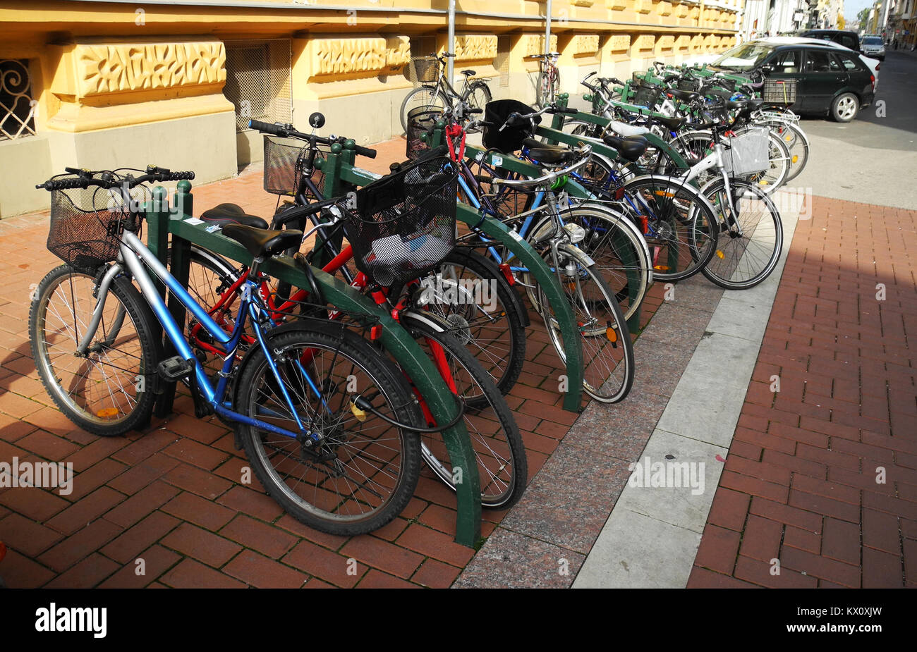 Bicycles Parked On The Street Stock Photo Alamy