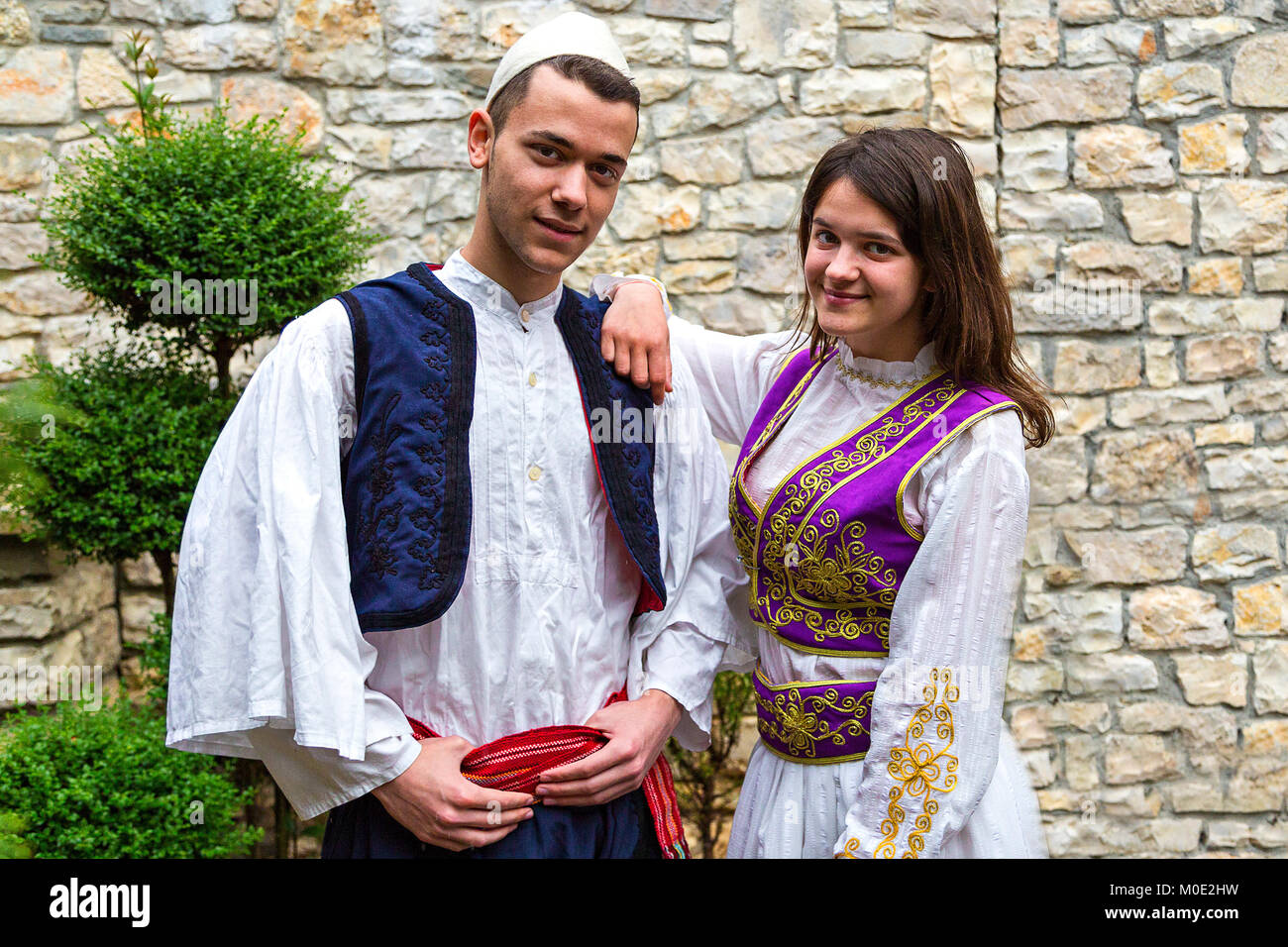 young-albanian-couple-in-national-costumes-in-berat-albania-M0E2HW.jpg
