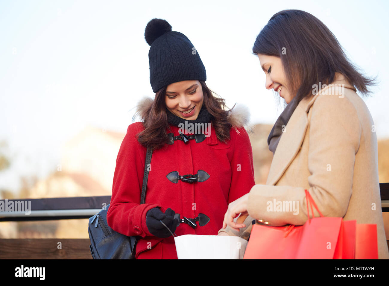 Women Walking With Shopping Bags Stock Photo Alamy