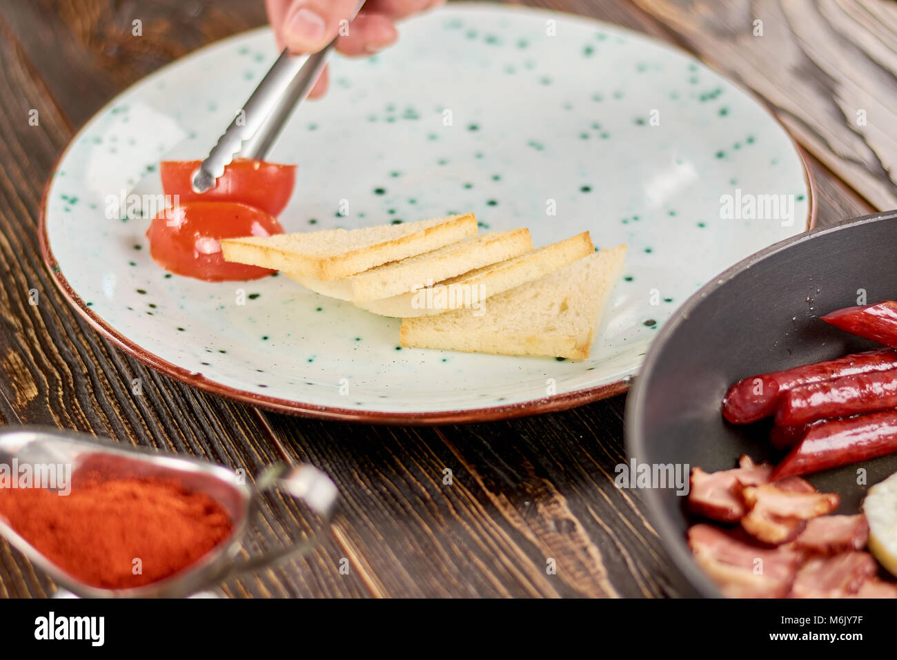 Chef Putting English Breakfast On Plate Stock Photo Alamy