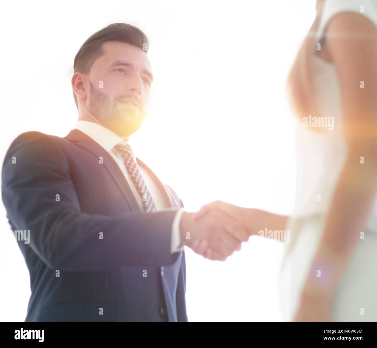 Two Business Workers Shake Hands In Office Stock Photo Alamy