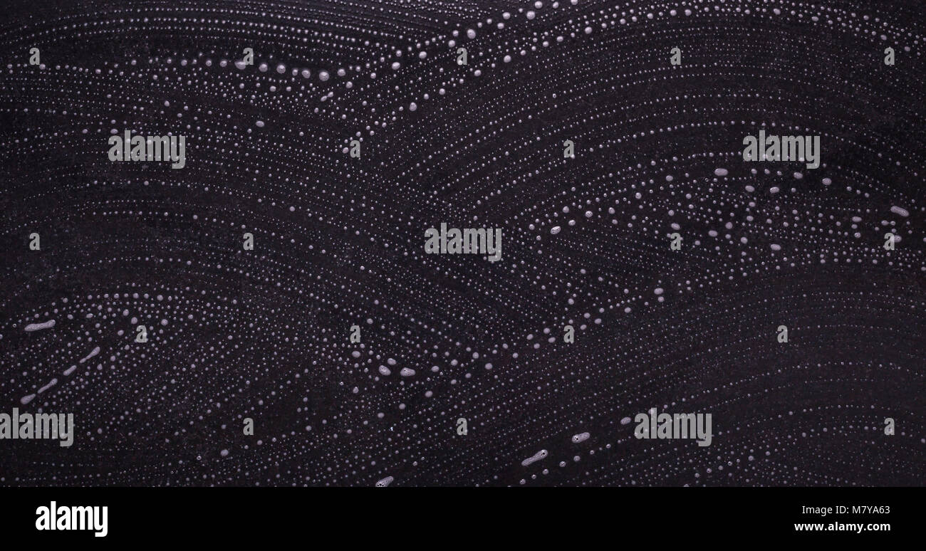 Abstract Black Stone Floor Ground Cleaning With White Soap Bubbles On Top Abstract Black Stone Floor Ground Cleaning With White Soap Bubbles On Top