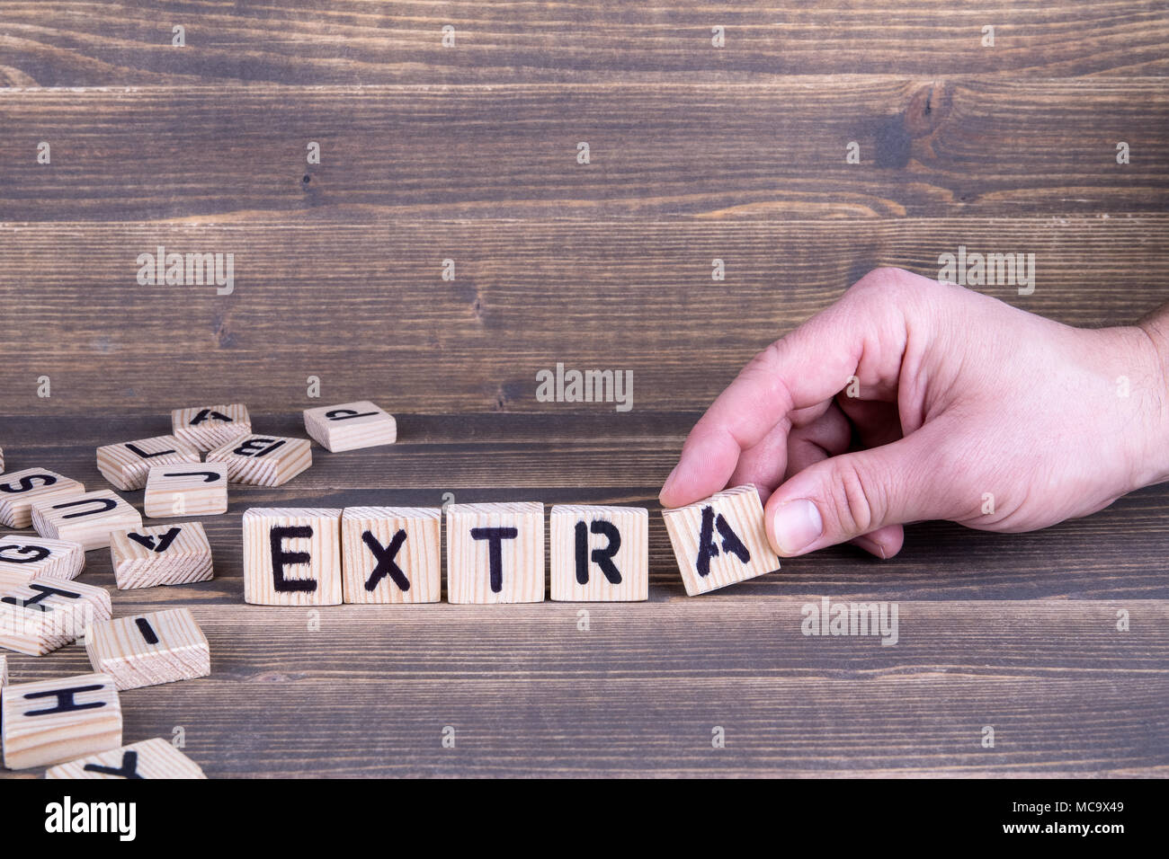 Extra Wooden Letters On The Office Desk Stock Photo Alamy