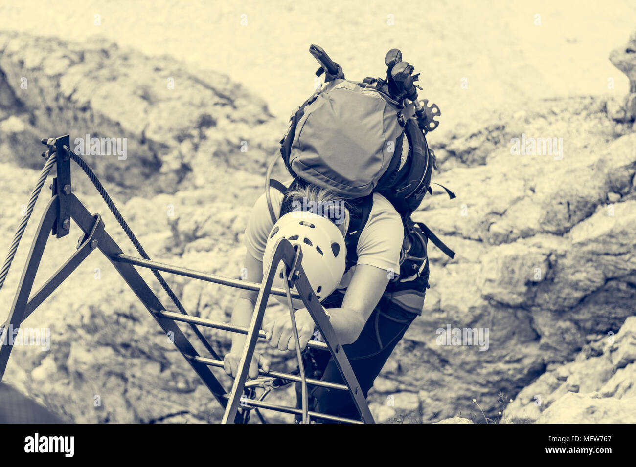 Climbers Tackling Via Ferrata Metalic Ladder Stock Photo Alamy