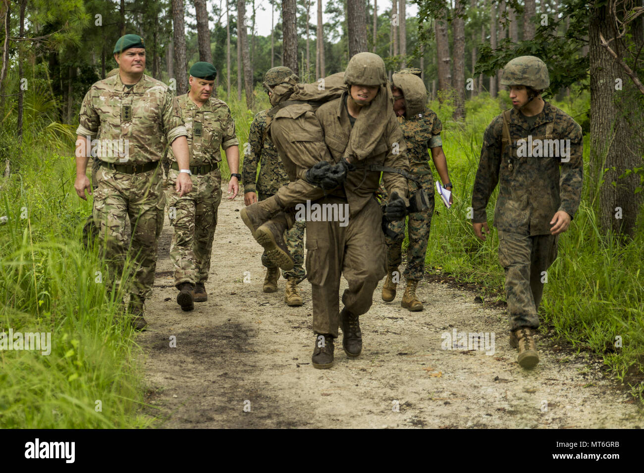 U S Marines And British Royal Marine Commandos Watch As A Recruit Of