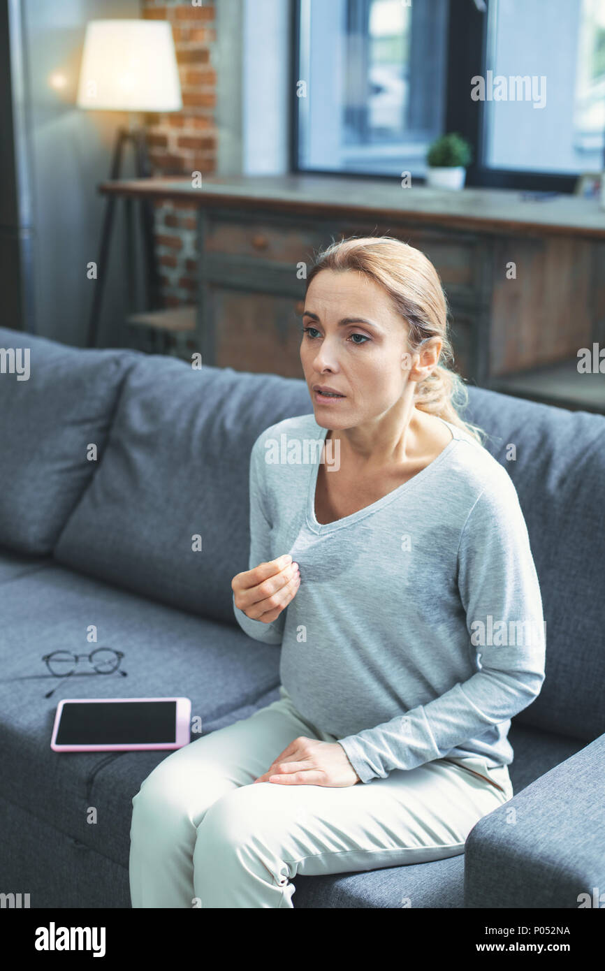 Serious Mature Woman Onsetting Menopause Stock Photo Alamy