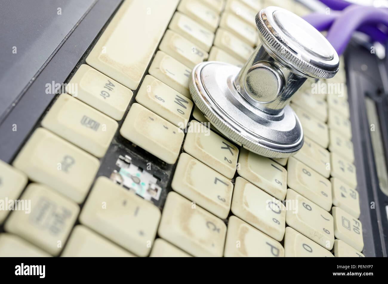 Stethoscope On Old And Dirty Laptop Keyboard Stock Photo Alamy