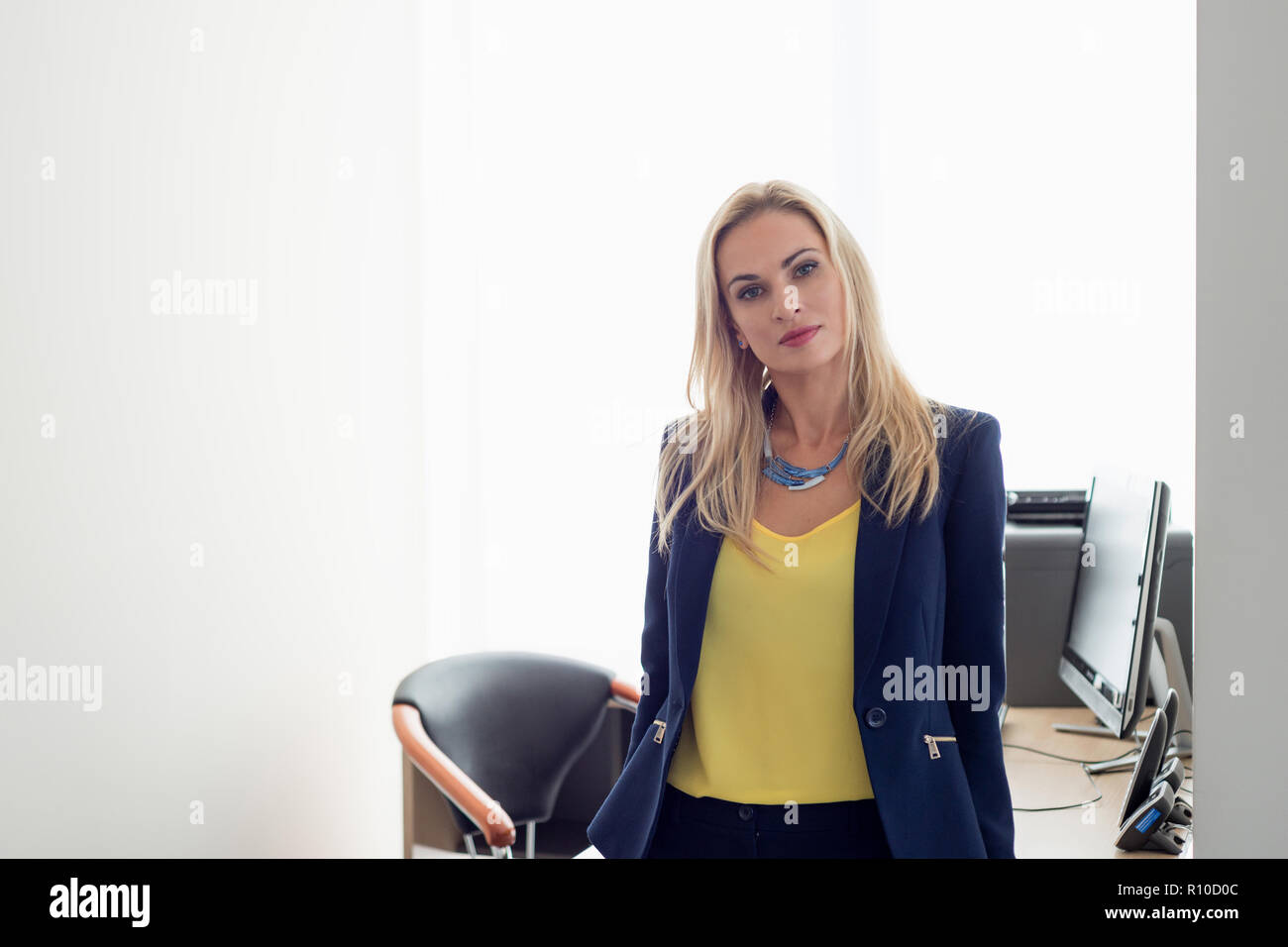 Portrait Of A Beautiful Blonde Business Woman Stock Photo Alamy