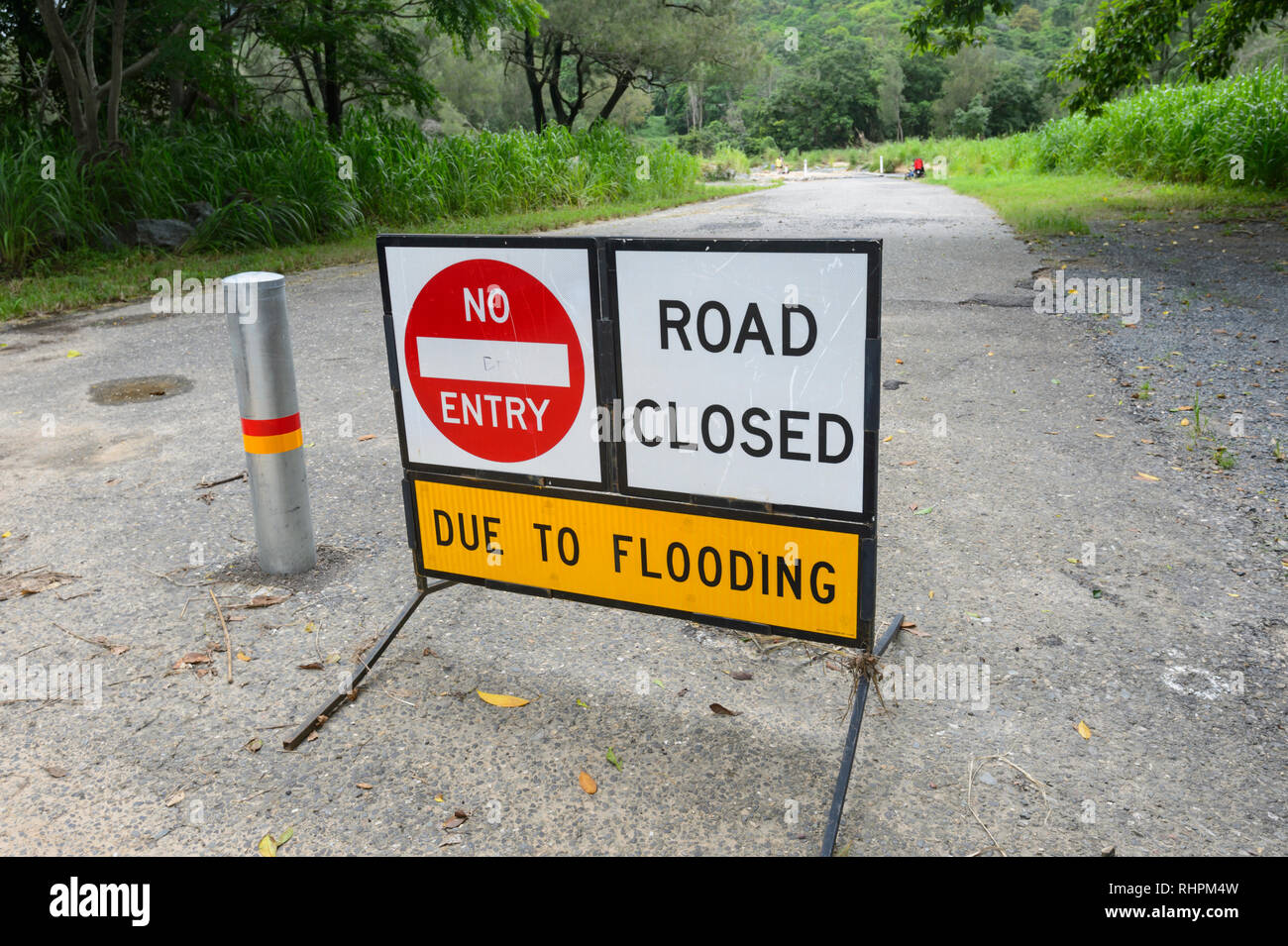 Road Sign Road Closed Due To Flooding During A Heavy Monsoon Cairns