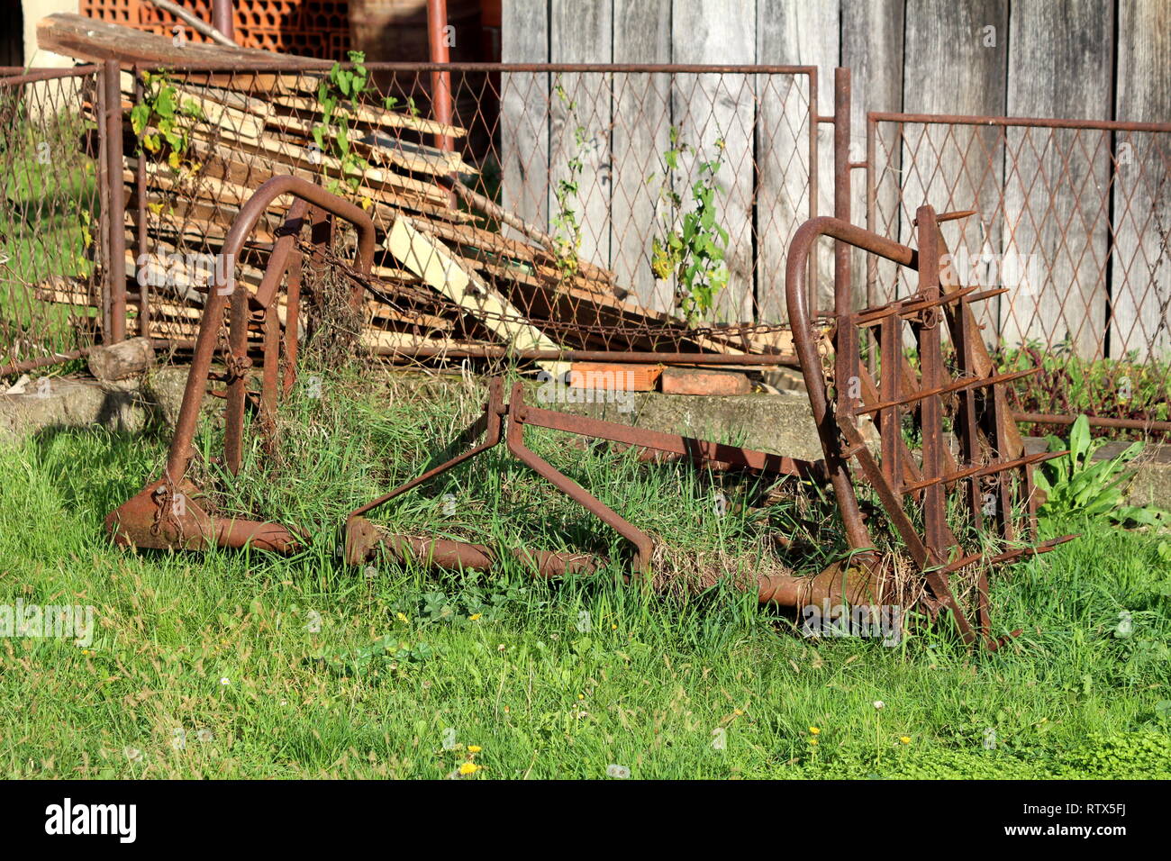 Rusted Abandoned Vintage Agricultural Farming Equipment Used To Work