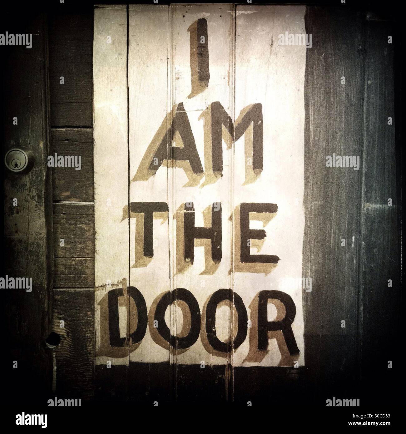 I Am The Door Painted On The Door To The Basement Of The City