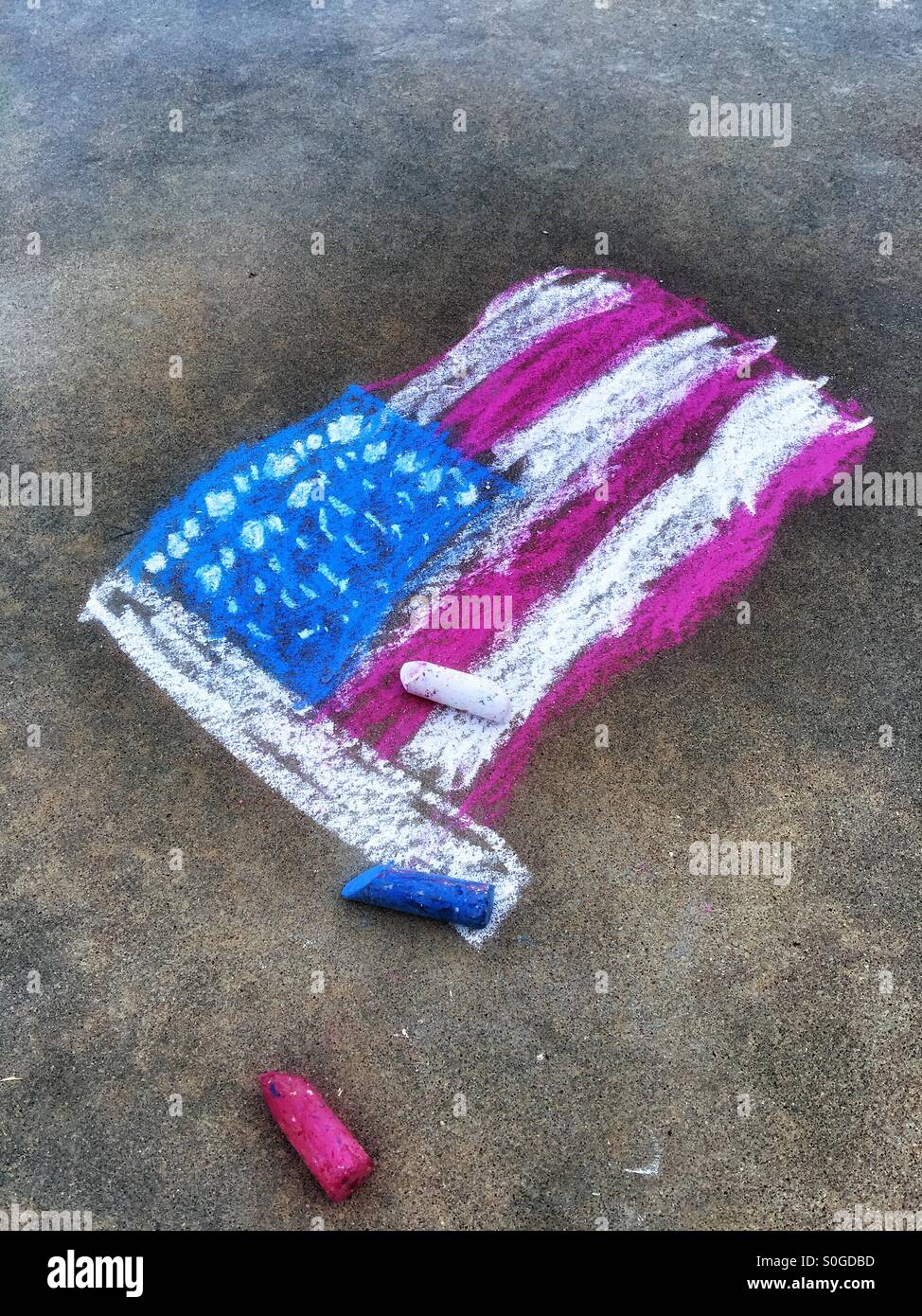 Chalkdrawn American flag on driveway Stock Photo, Royalty Free Image