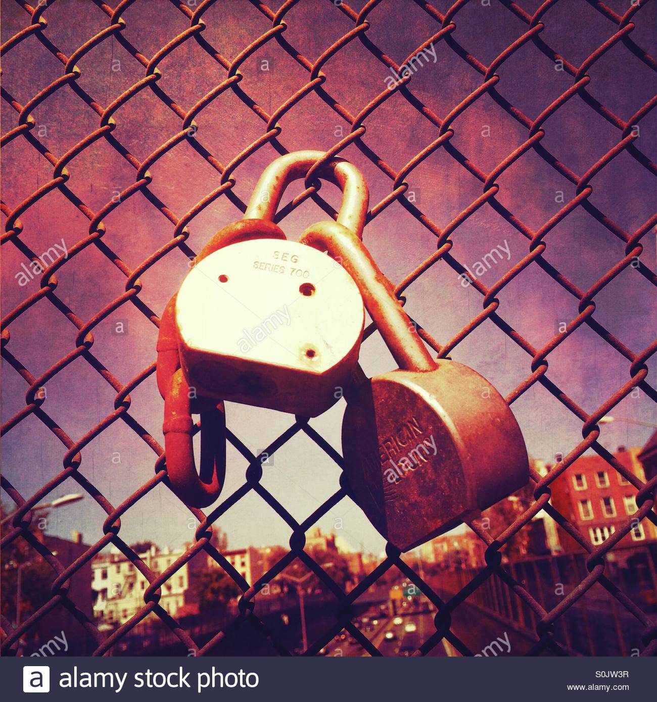 padlocks-on-chain-link-fence-by-the-high