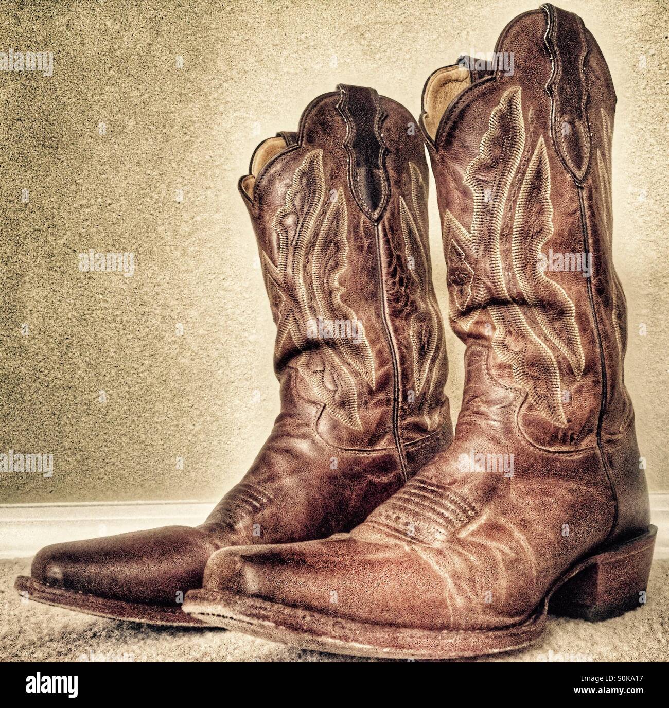 Worn cowboy boots Stock Photo, Royalty Free Image: 310211587 - Alamy