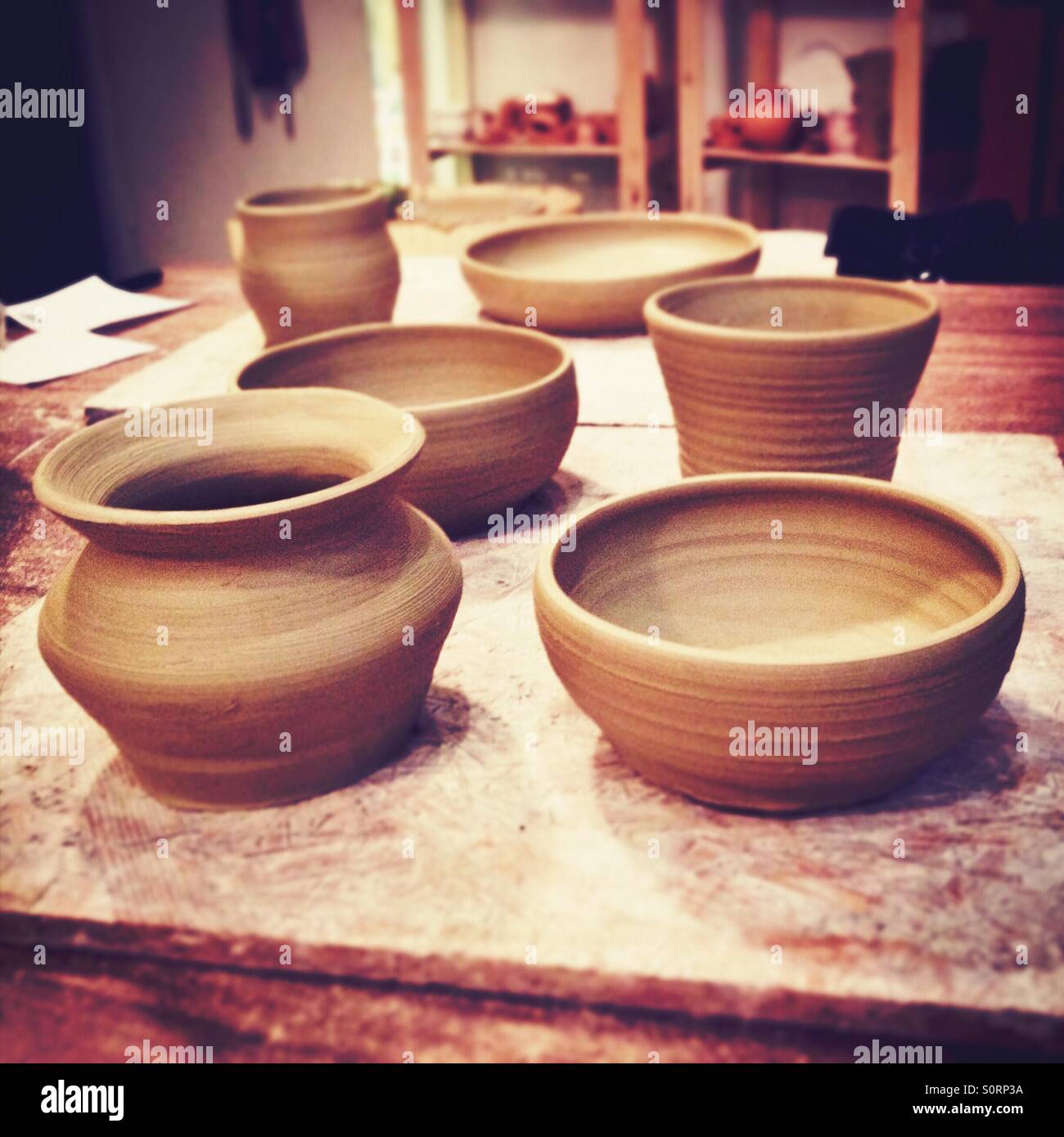 Greenware ceramics ready to be fired Stock Photo, Royalty Free Image