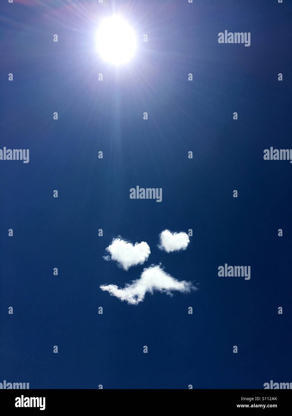 clouds-form-a-man-in-love-emoji-with-hea