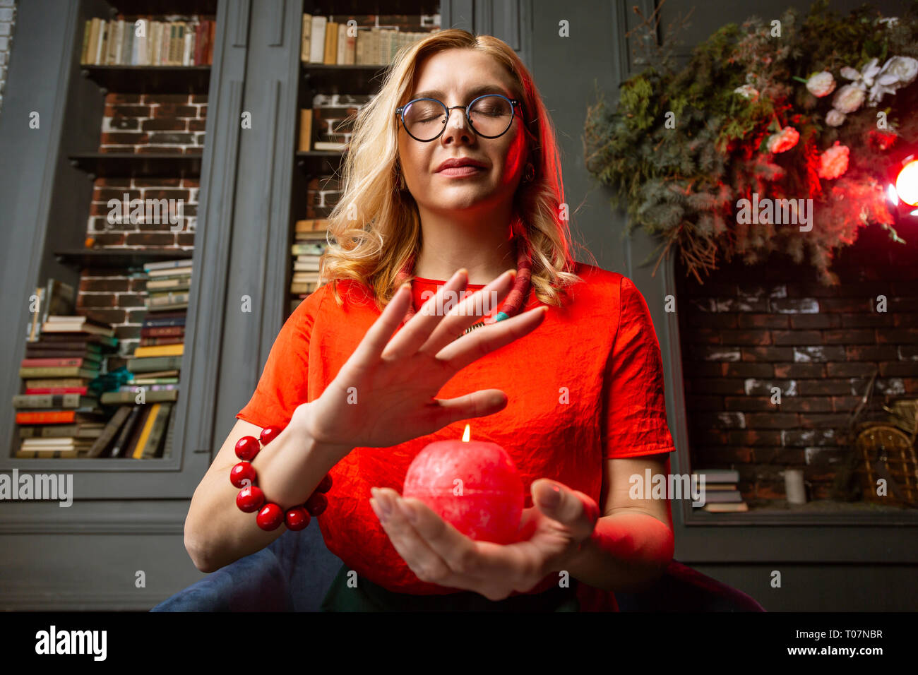 Appealing Blonde Future Teller Feeling Joyful While Predicting Future