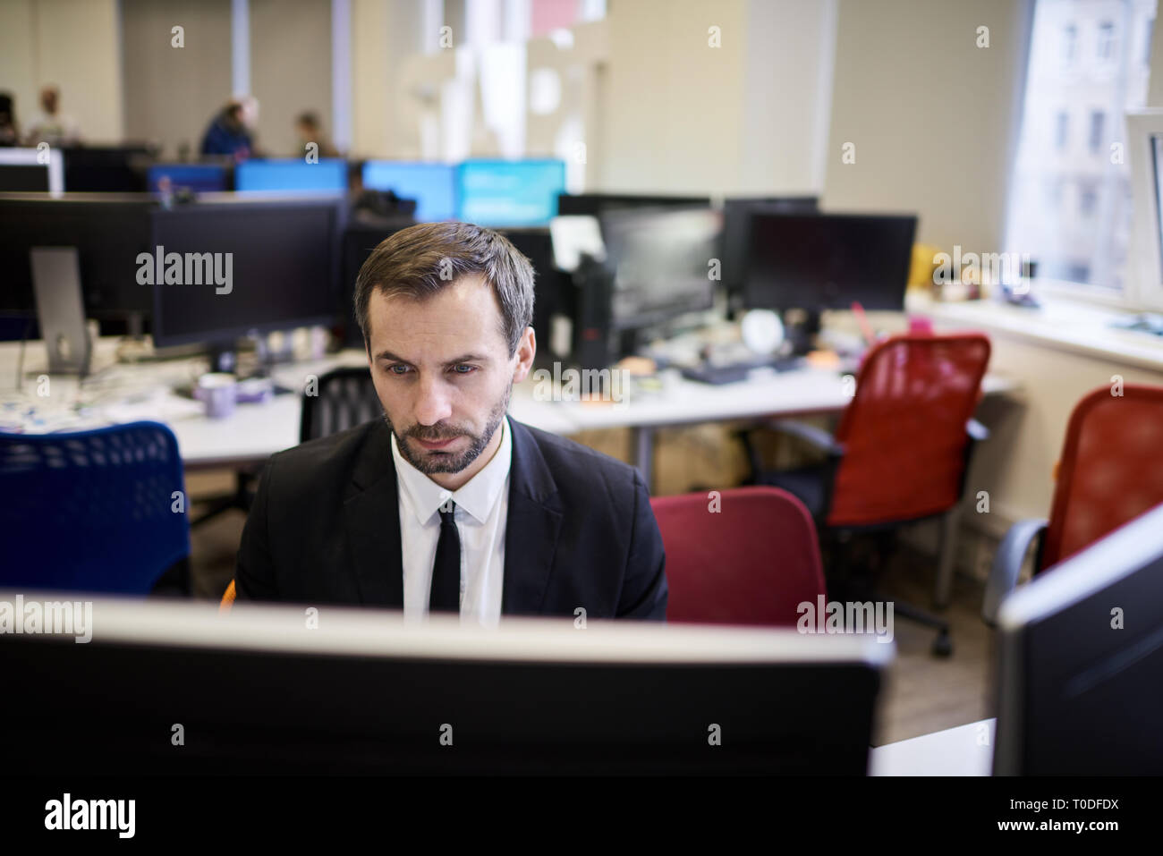 Mature Office Worker Using PC Stock Photo Alamy