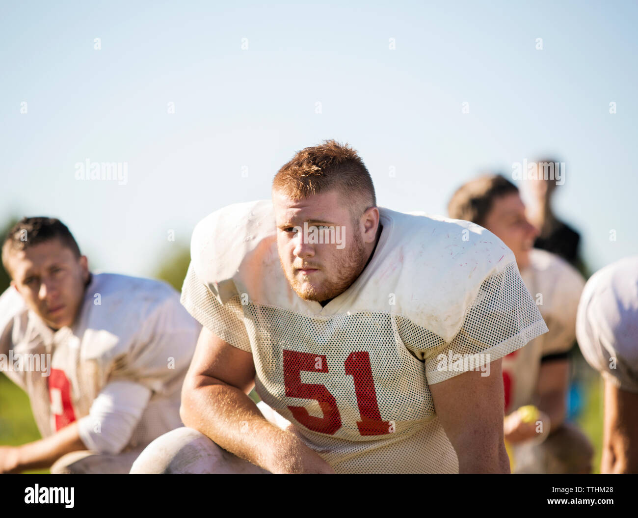 Three Kneeling Men Hi Res Stock Photography And Images Alamy