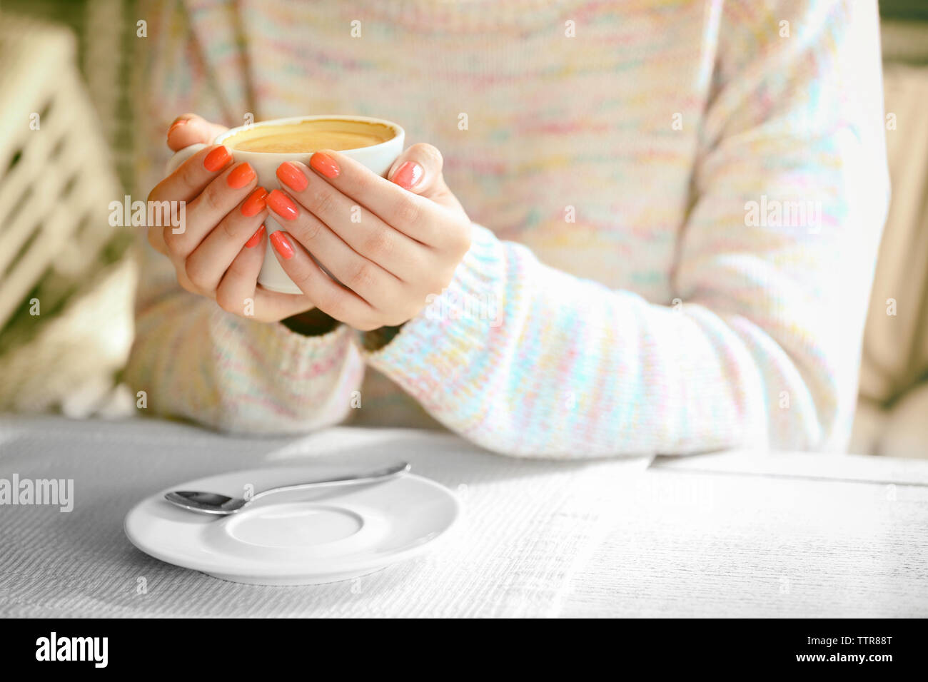 Woman Hands Holding Cup Of Coffee In Cafe Stock Photo Alamy