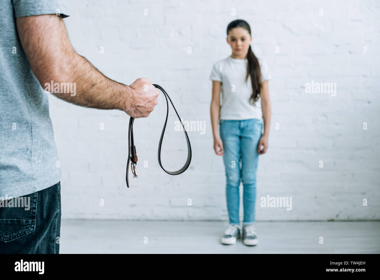 Stepfather punishes daughter image