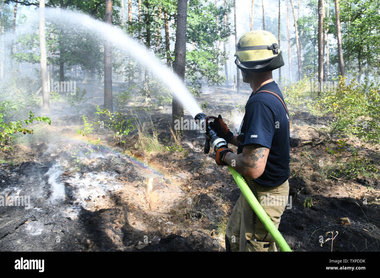 Berlin Germany 25th June 2019 A Fireman Extinguishes The Fire In