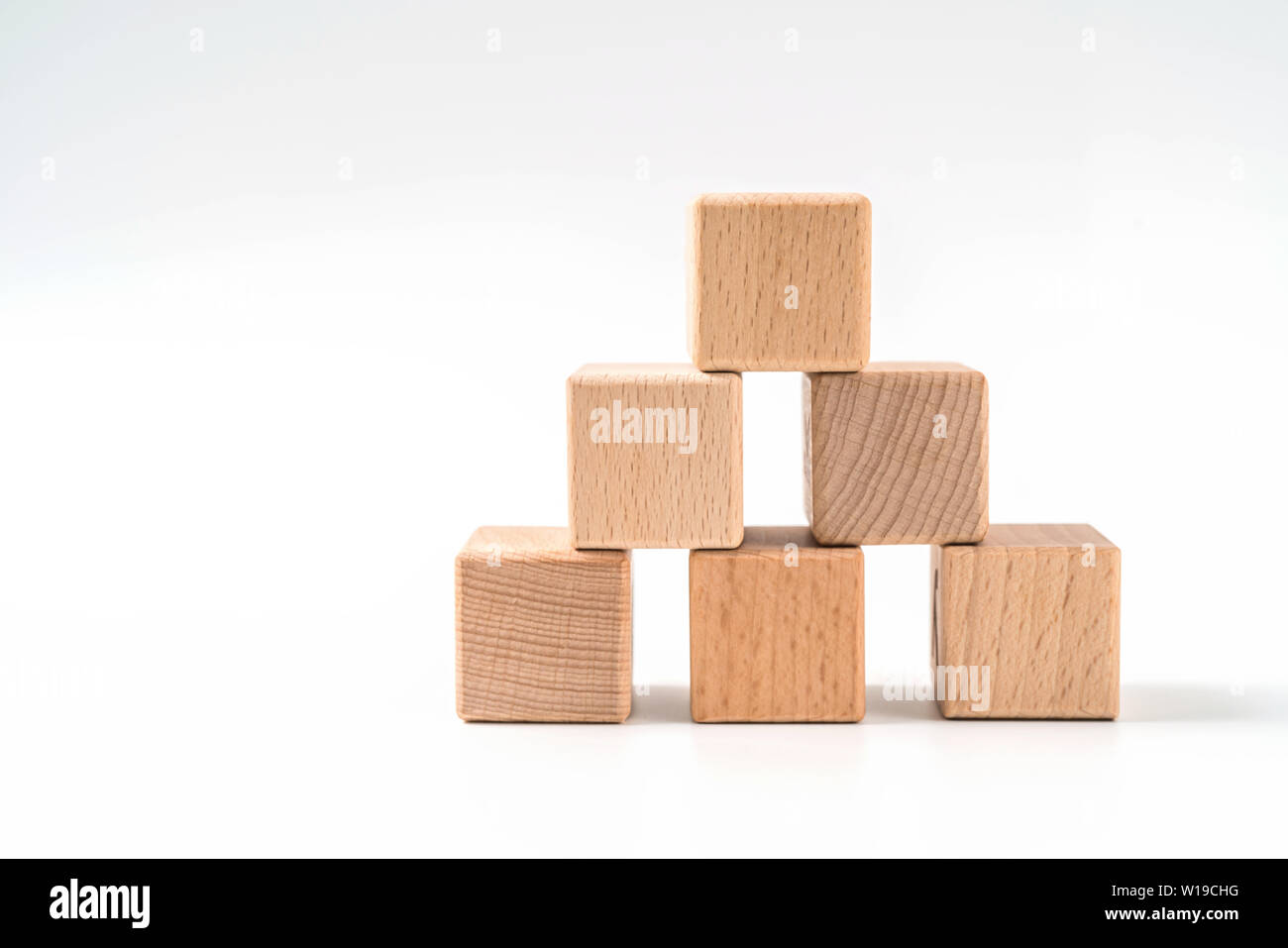 Wood Cube Arrange In Pyramid Shape Business Concept Stock Photo Alamy