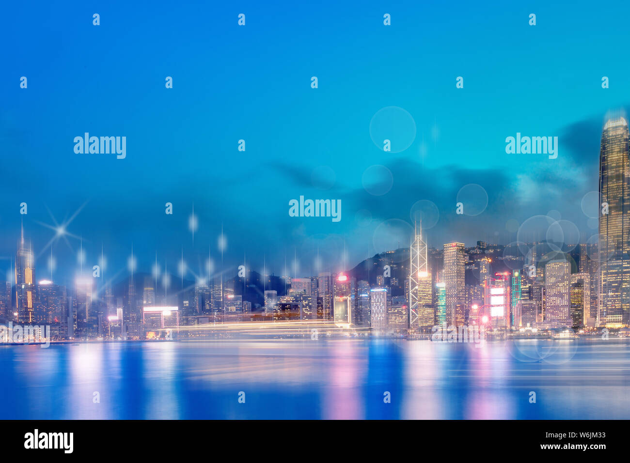 Hong Kong Cityscape At Night View From Victoria Harbour Stock Photo