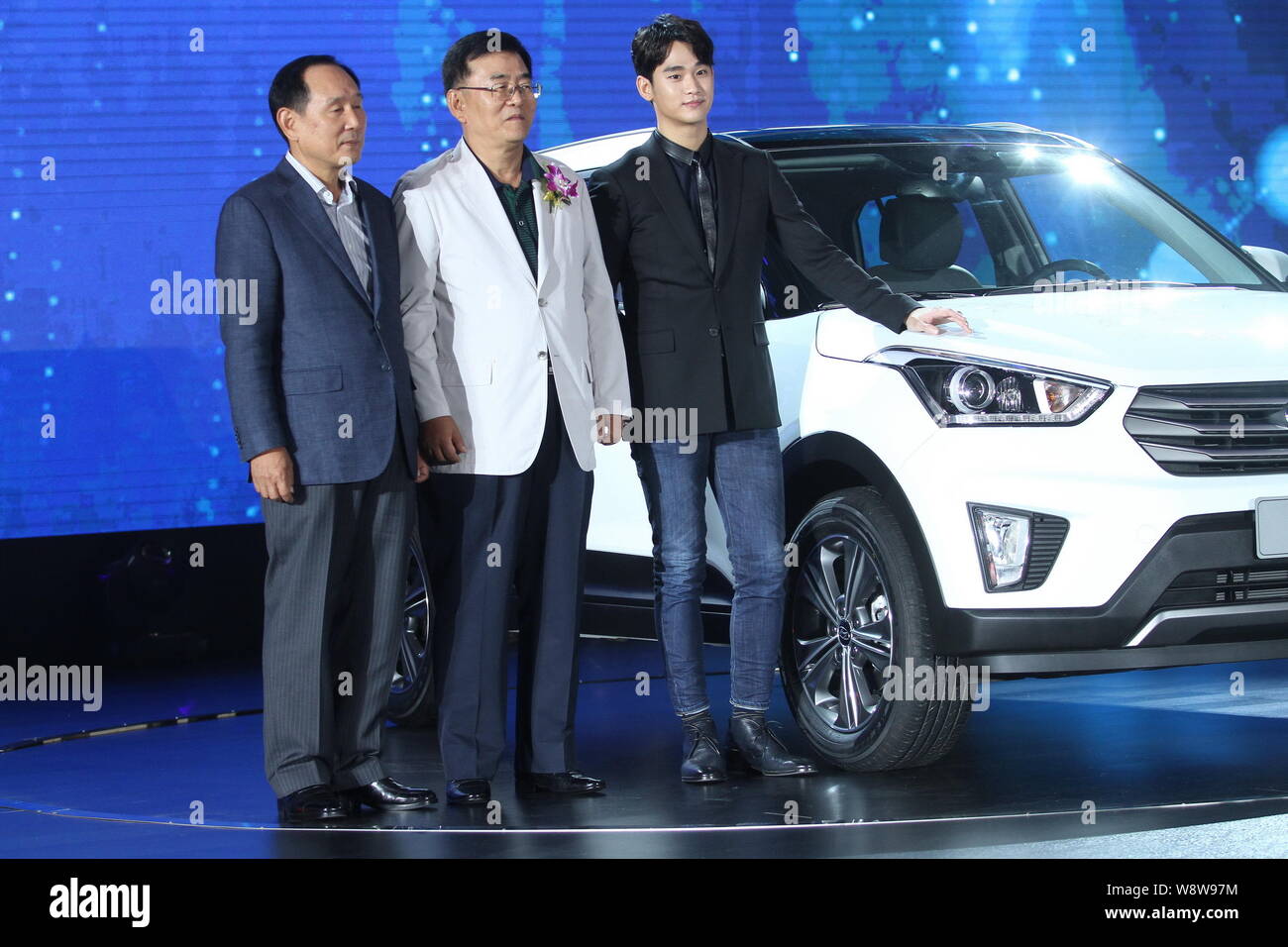 South Korean Actor Kim Soo Hyun Right Poses At A Launch Event For