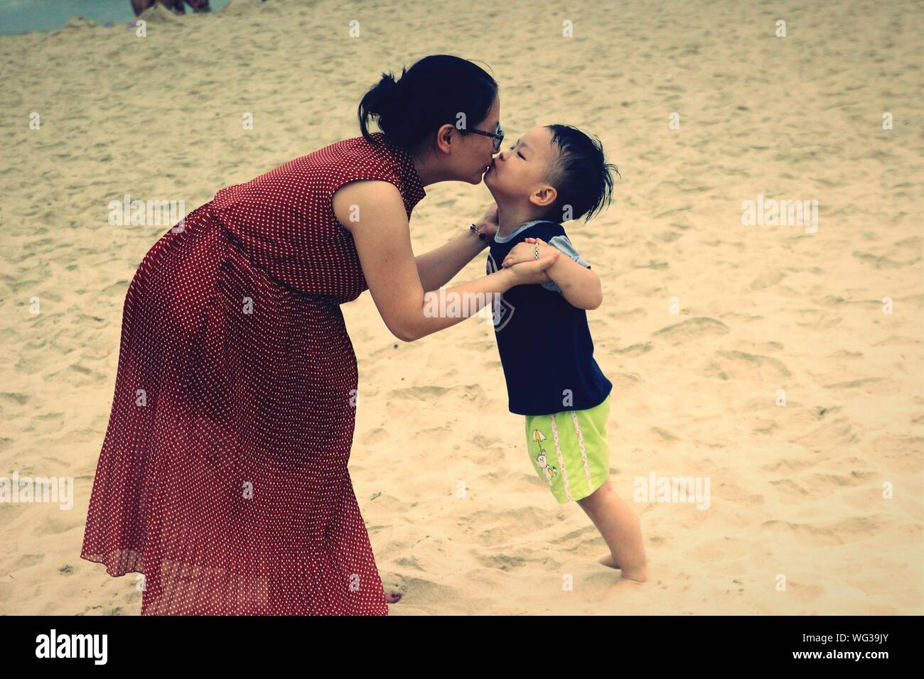 Mother Kissing Son Beach Hi Res Stock Photography And Images Alamy