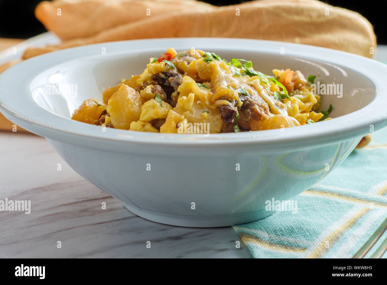 Breakfast Egg Scramble Bowl With Sausage Potatoes Mushrooms And Cheddar