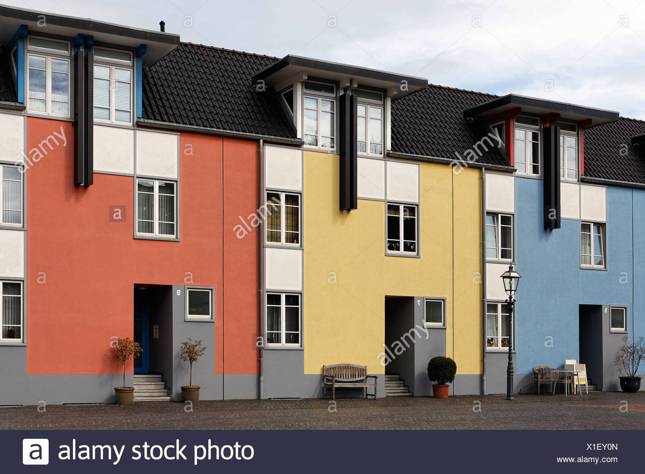 Three modern colorful row houses, Krefeld-Linn, North Rhine ... Three modern colorful row houses, Krefeld-Linn, North Rhine ...