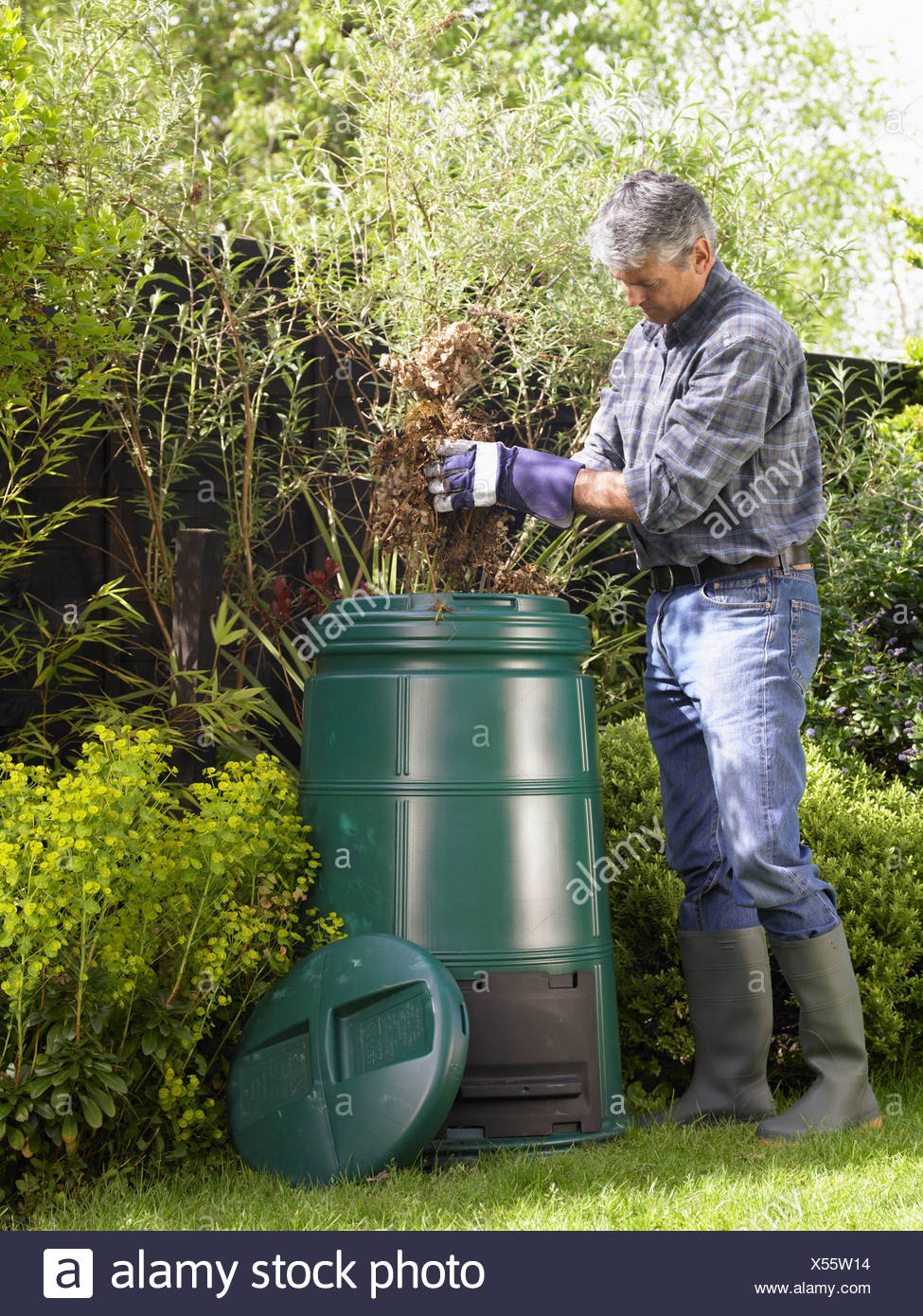 Man Composting In Backyard Stock Photo 278568560 Alamy