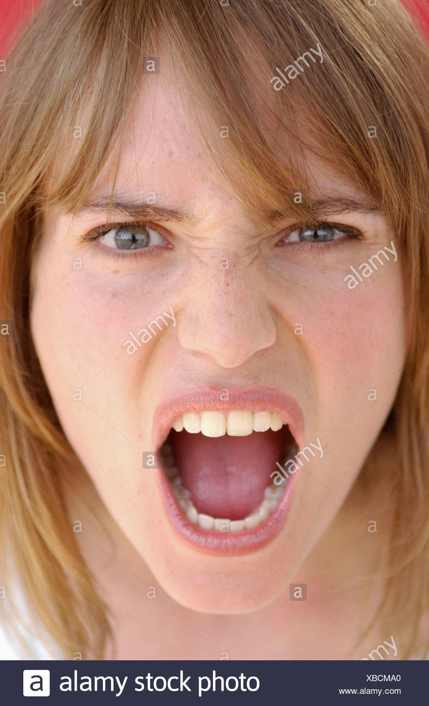 female long light brown hair and fringe wearing subtle eye make up