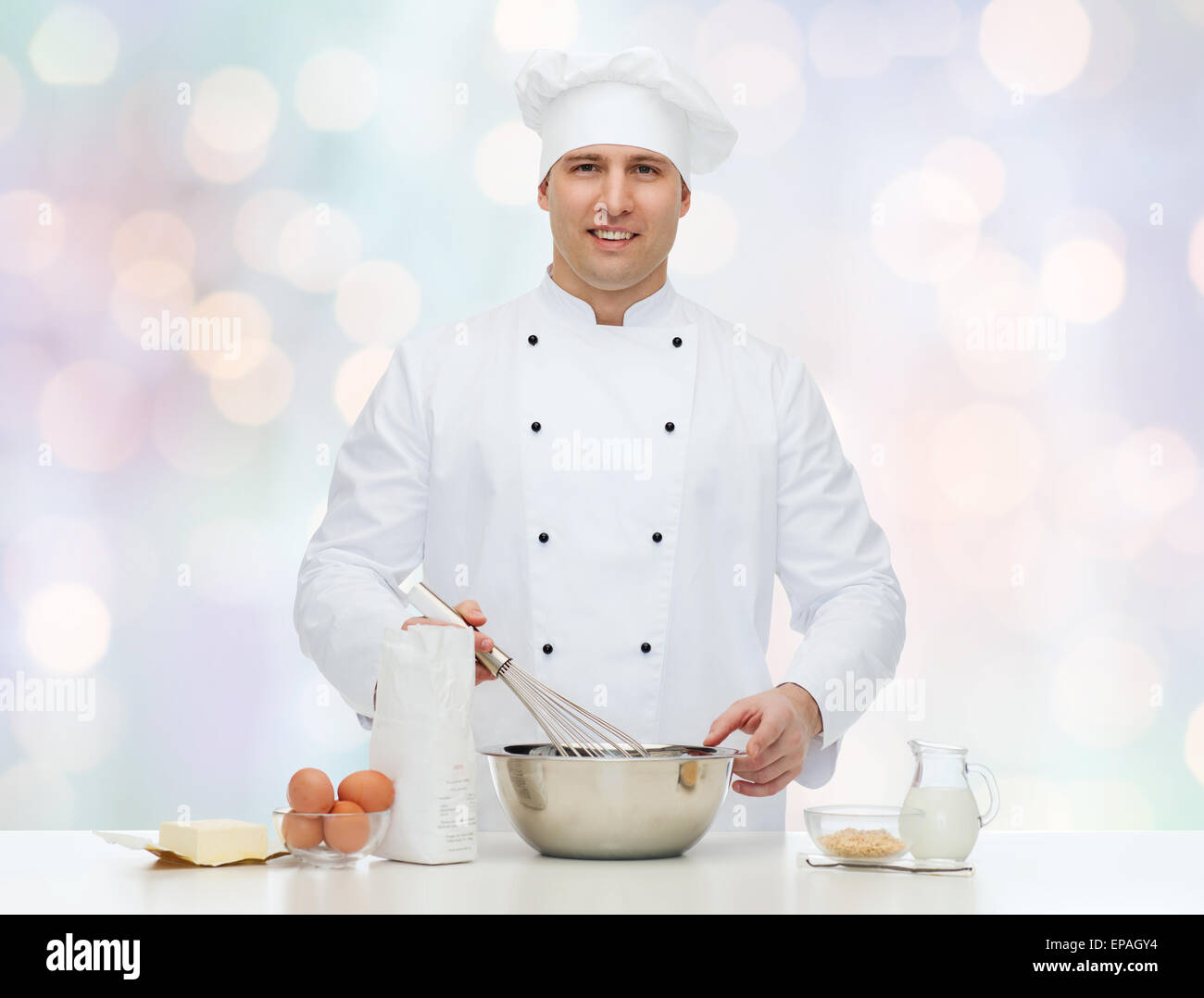 glücklich männlichen Chef Kochen Backen Stockfotografie Alamy