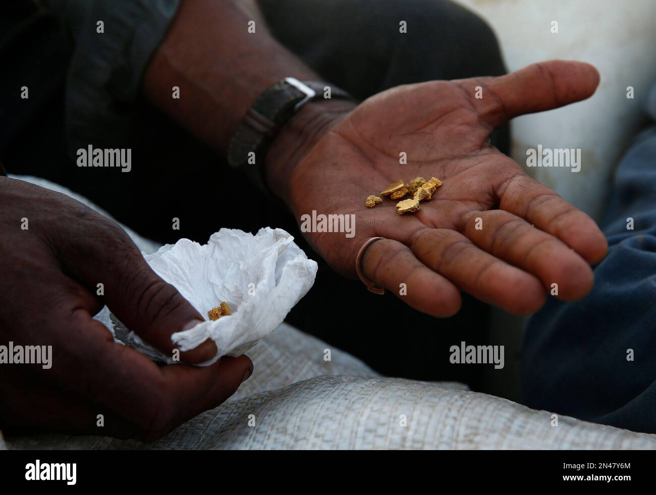 A Miner Shows Gold He Extracted Illegally As He Leaves The Yanomami