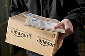 man-holding-amazon-packages-D3PAWN.jpg