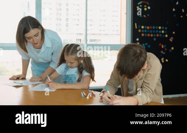 Student Explains Work Young smart teacher explain about classwork while student answer ...