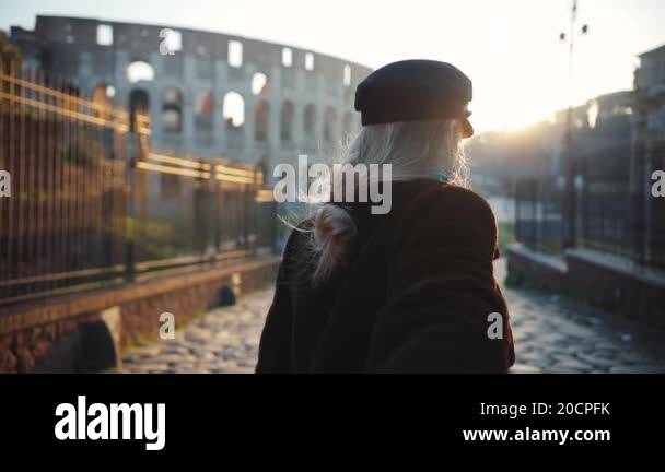 ROME, ITALY - May 19, 2017 : Follow me young woman leading a man ...