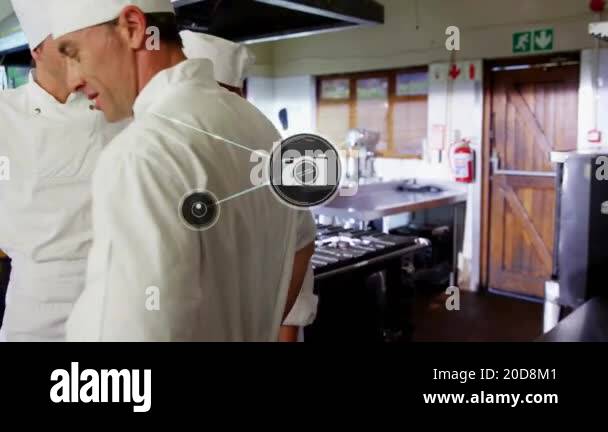 Animation of network of connections with icons over diverse cooks in ...