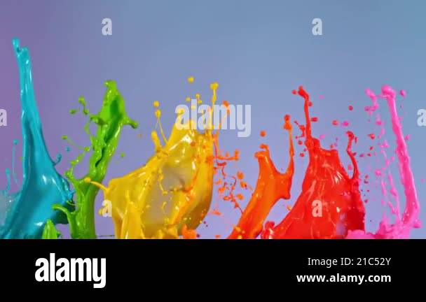 Super slow motion of dancing colors shapes isolated on color background ...