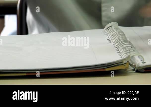 Student Ripping Assignment Primary Student in Argentina Ripping Papers from Folder to Celebrate ...