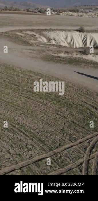 Horse riding sport shot with drone from the air, horse galloping on a ...