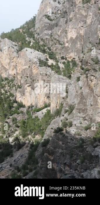 Cliff rocks in mountain, drone view of cliffs formed by sharp hard ...