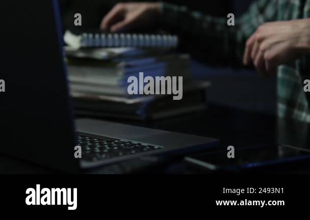 Close up a man working on computer, using touchpad, typing corporate ...